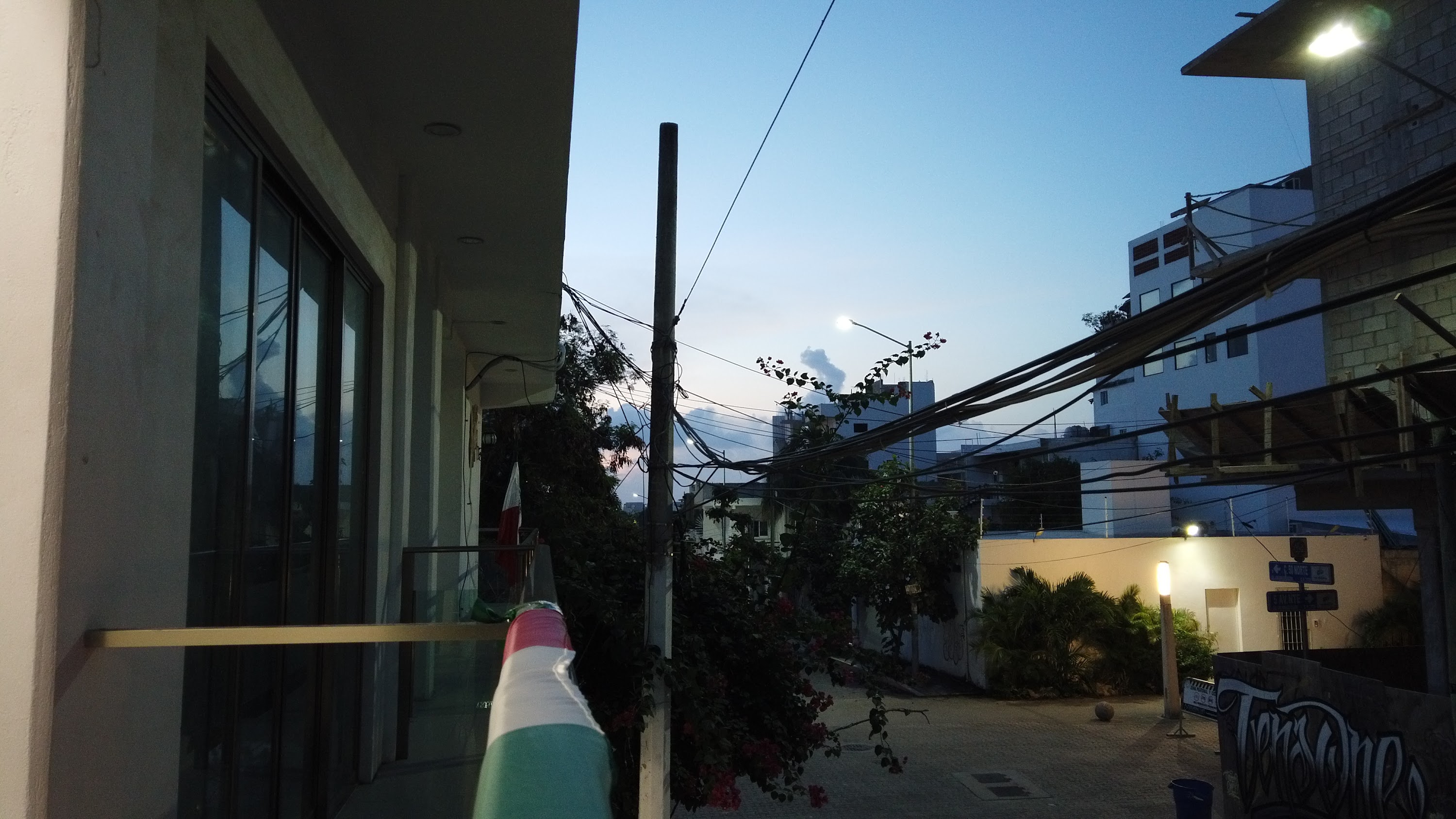 Multi-Story Concrete Building Under Construction at Dusk