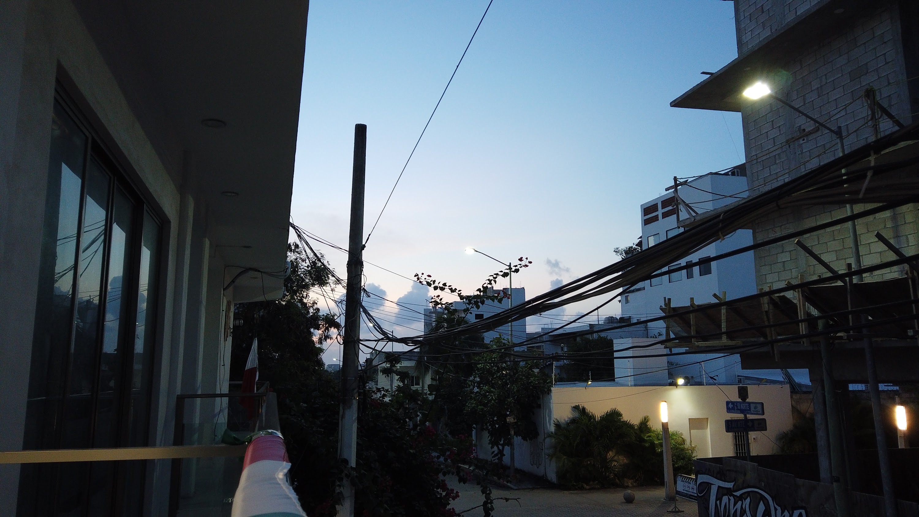 Multi-Story Concrete Building Under Construction at Dusk