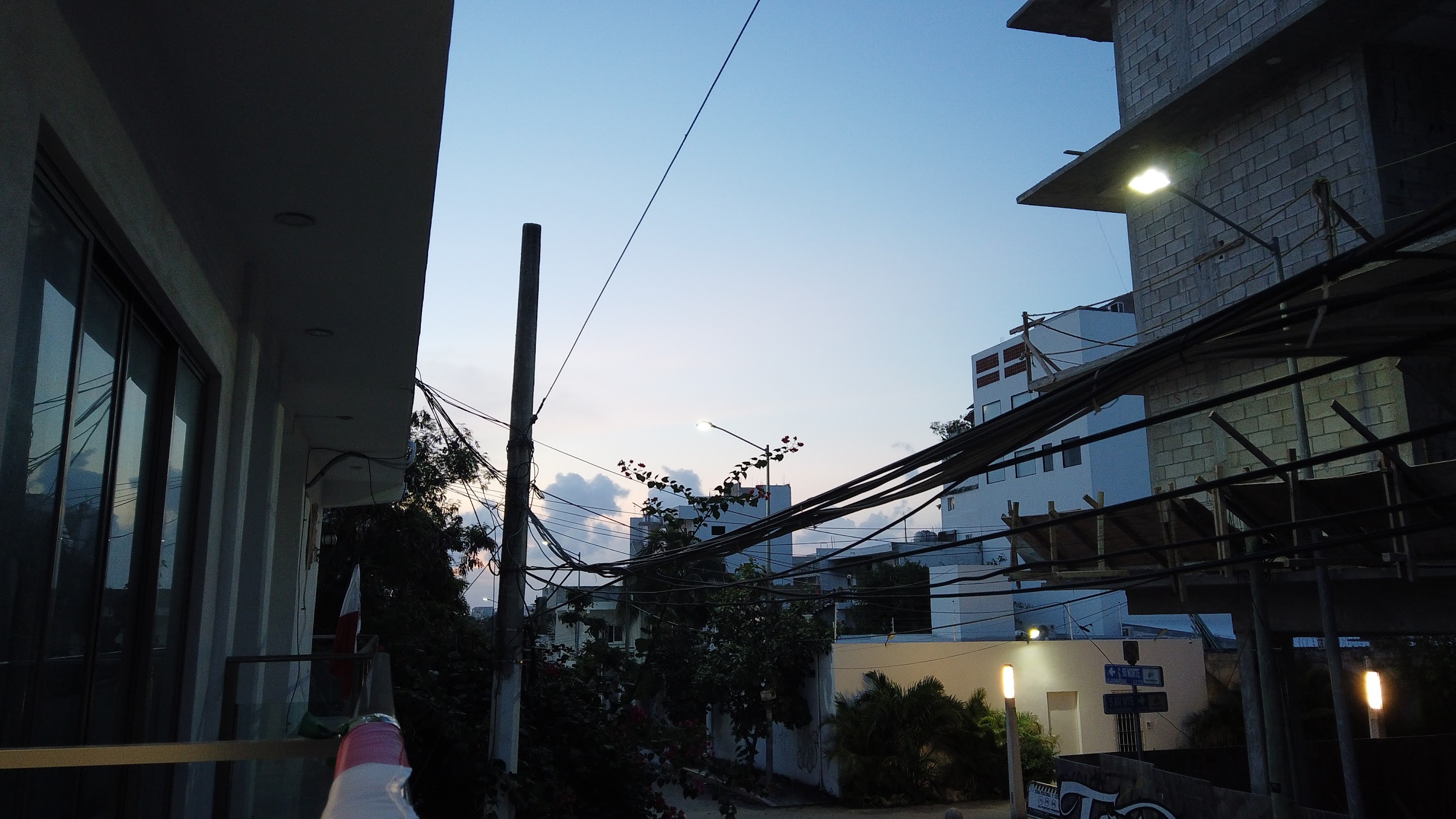 Multi-Story Concrete Building Under Construction at Dusk