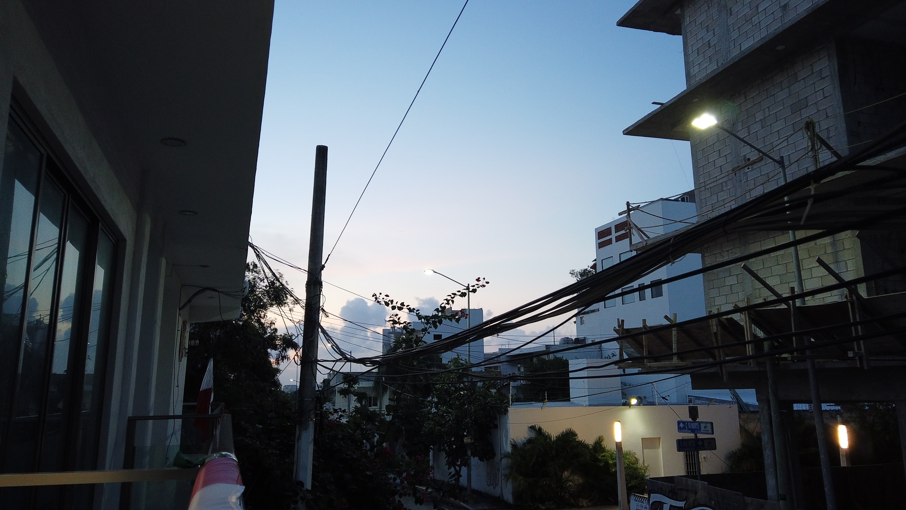 Multi-Story Concrete Building Under Construction at Dusk
