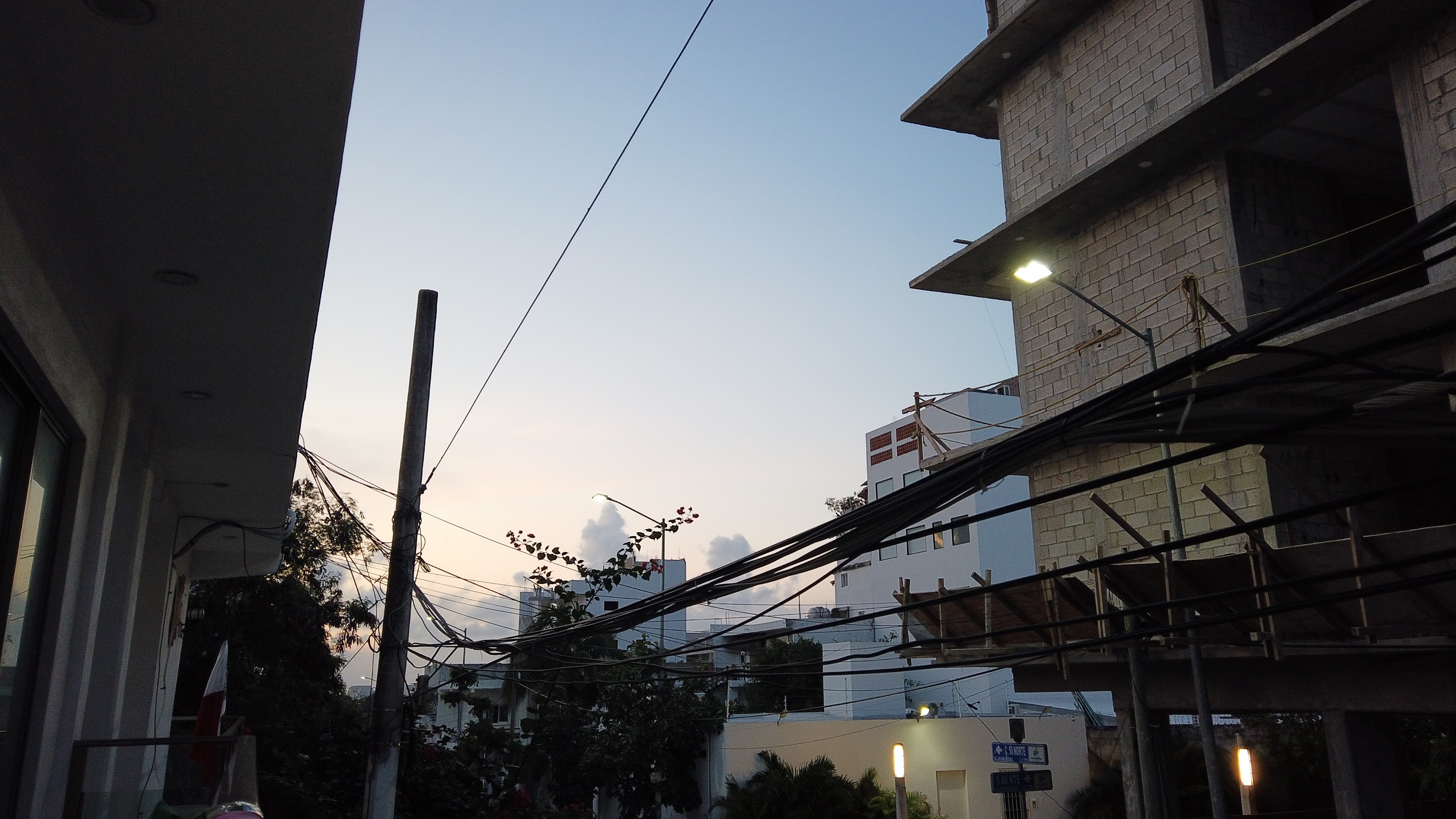 Multi-Story Concrete Building Under Construction at Dusk