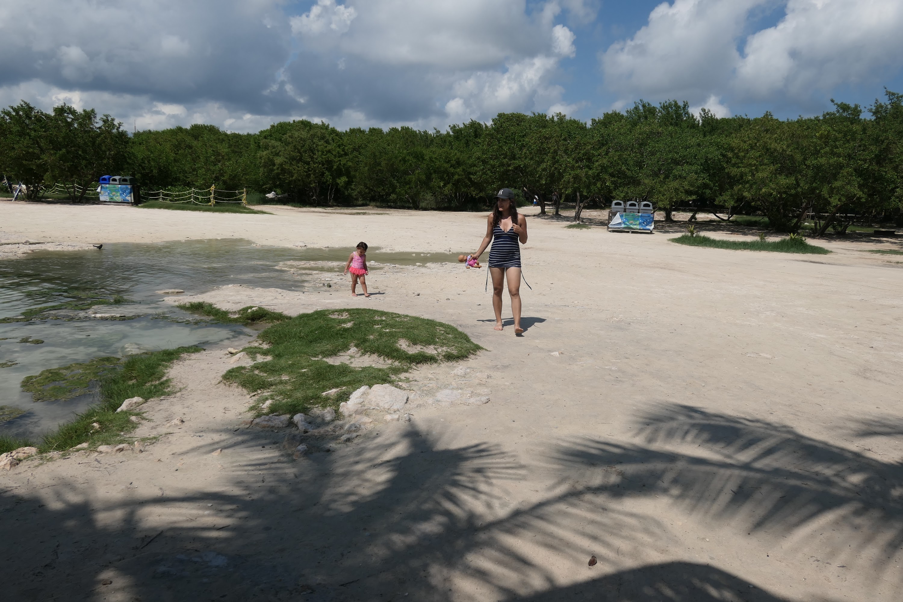 Woman and Child on Tropical Beach