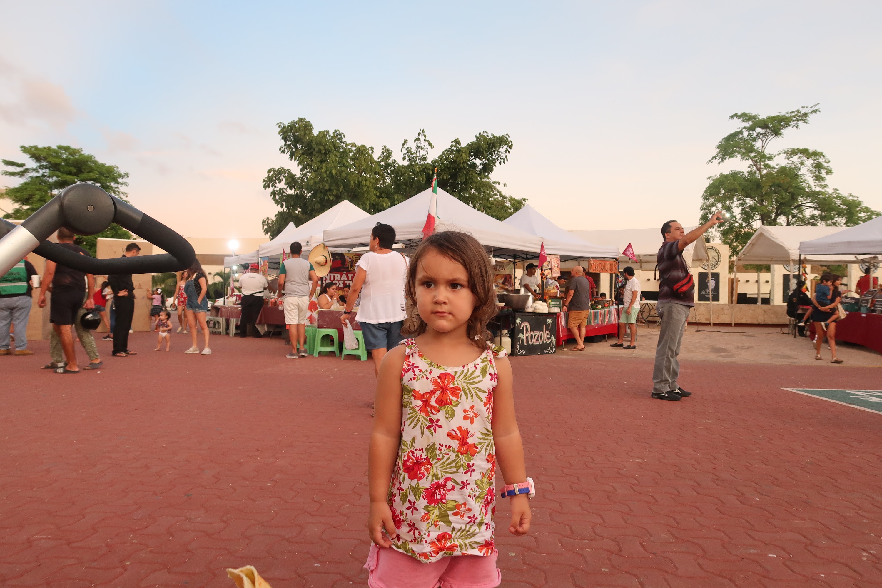 Young Girl at Outdoor Market