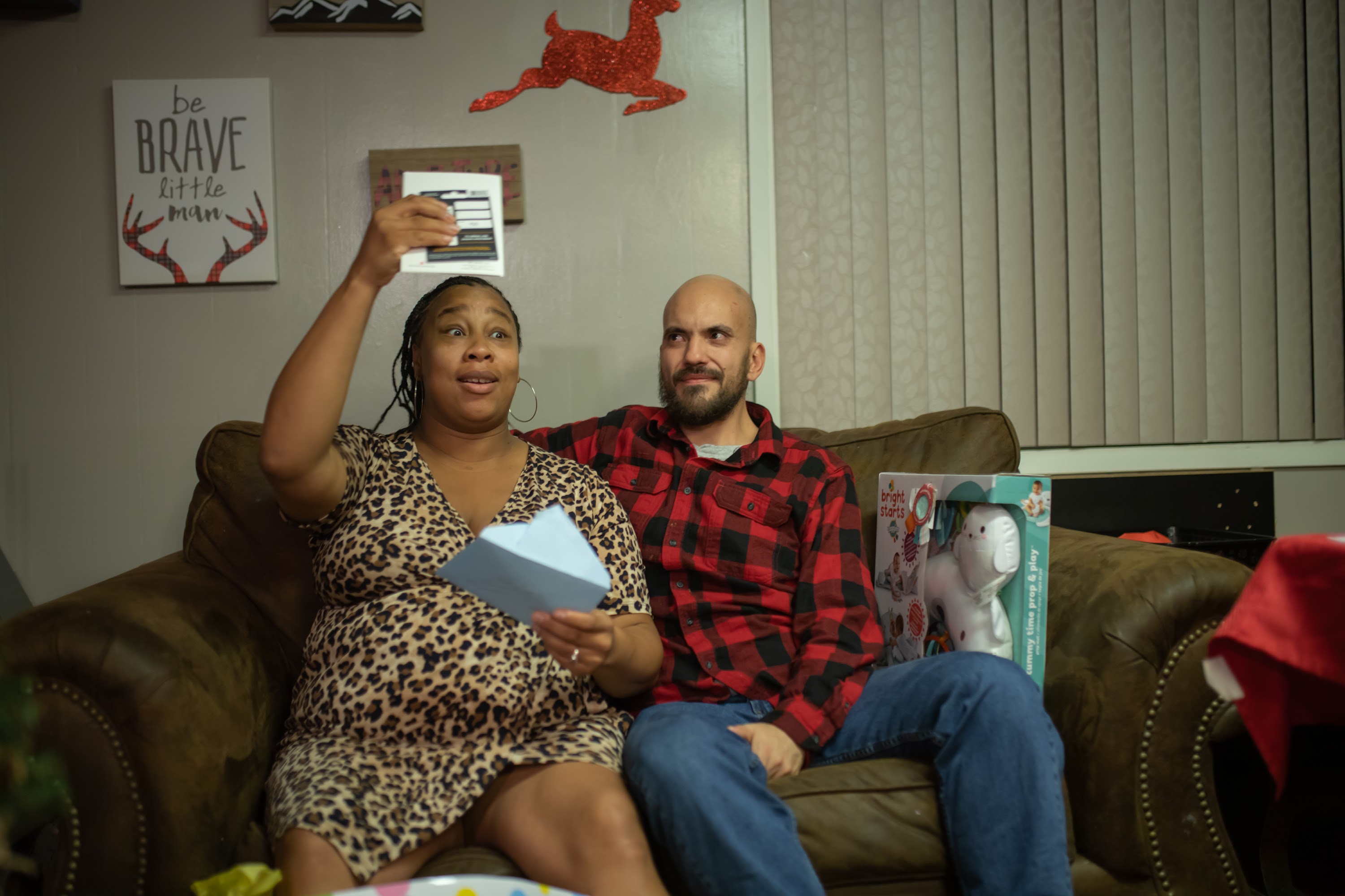 Pregnant Woman and Partner Celebrating Baby Shower