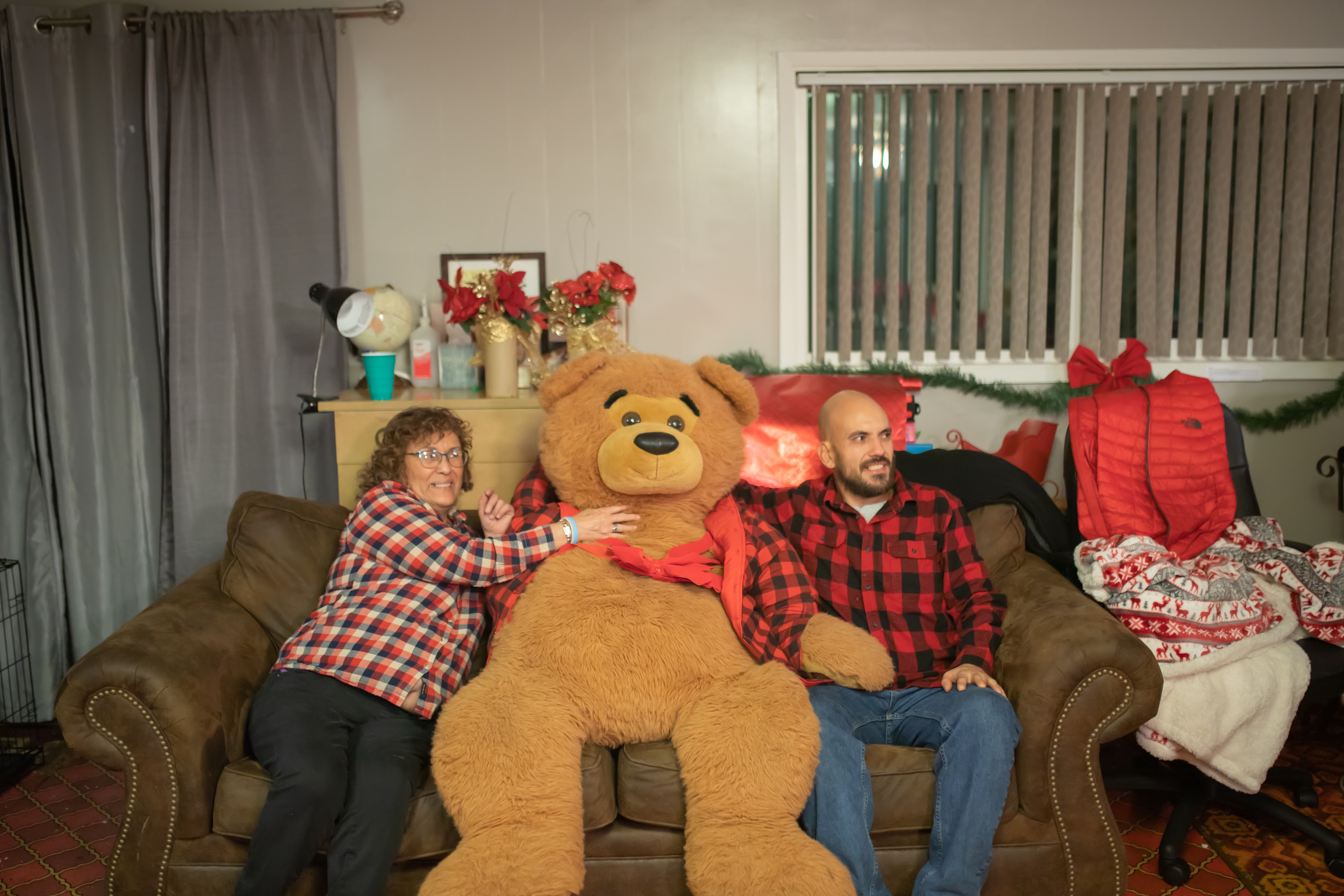 Family Holiday Photo with Giant Teddy Bear