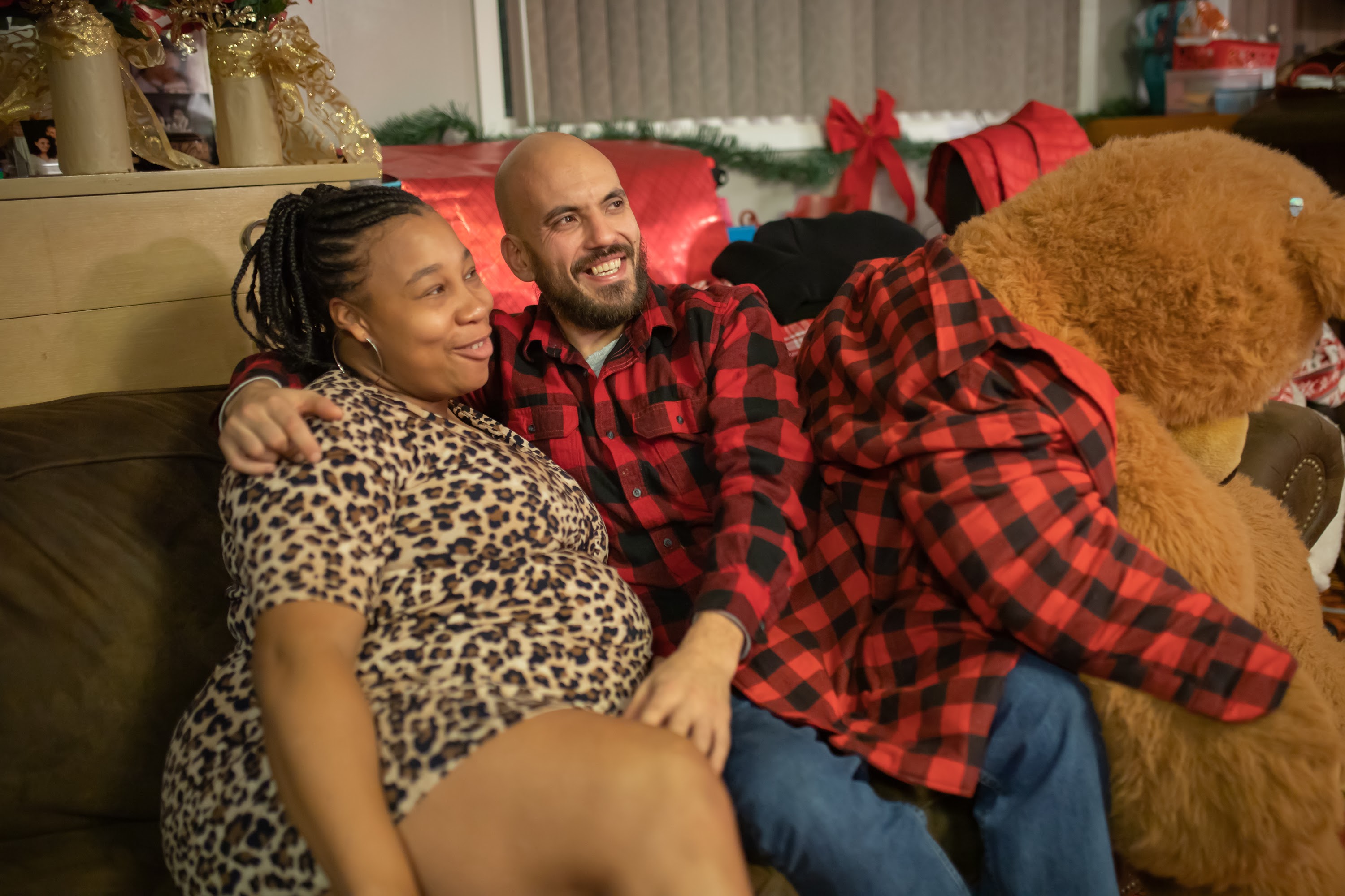 Couple Relaxing on Couch with Holiday Decor
