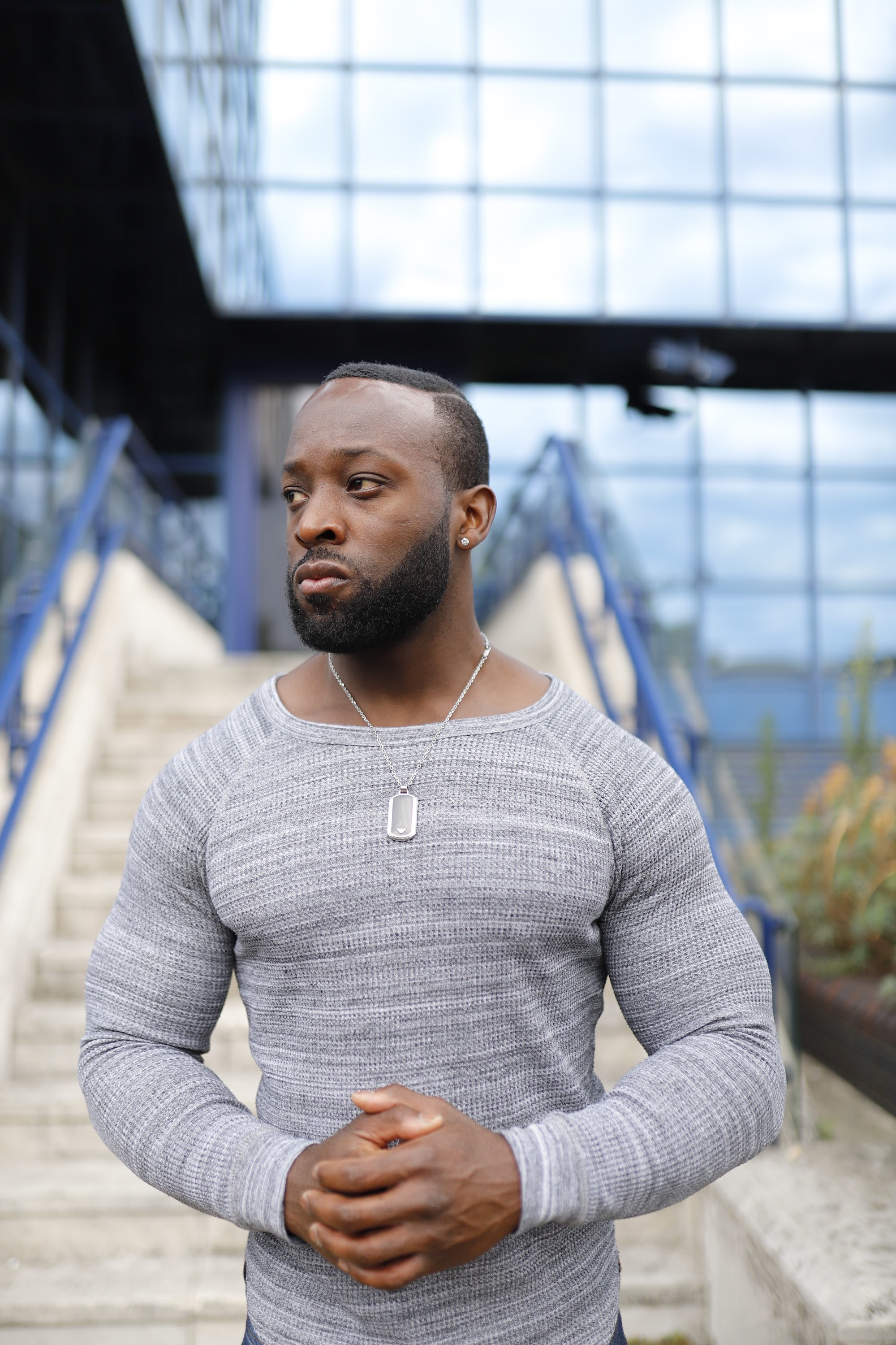 Male Portrait Against Concrete Wall