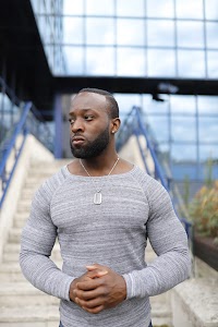 Male Portrait Against Concrete Wall