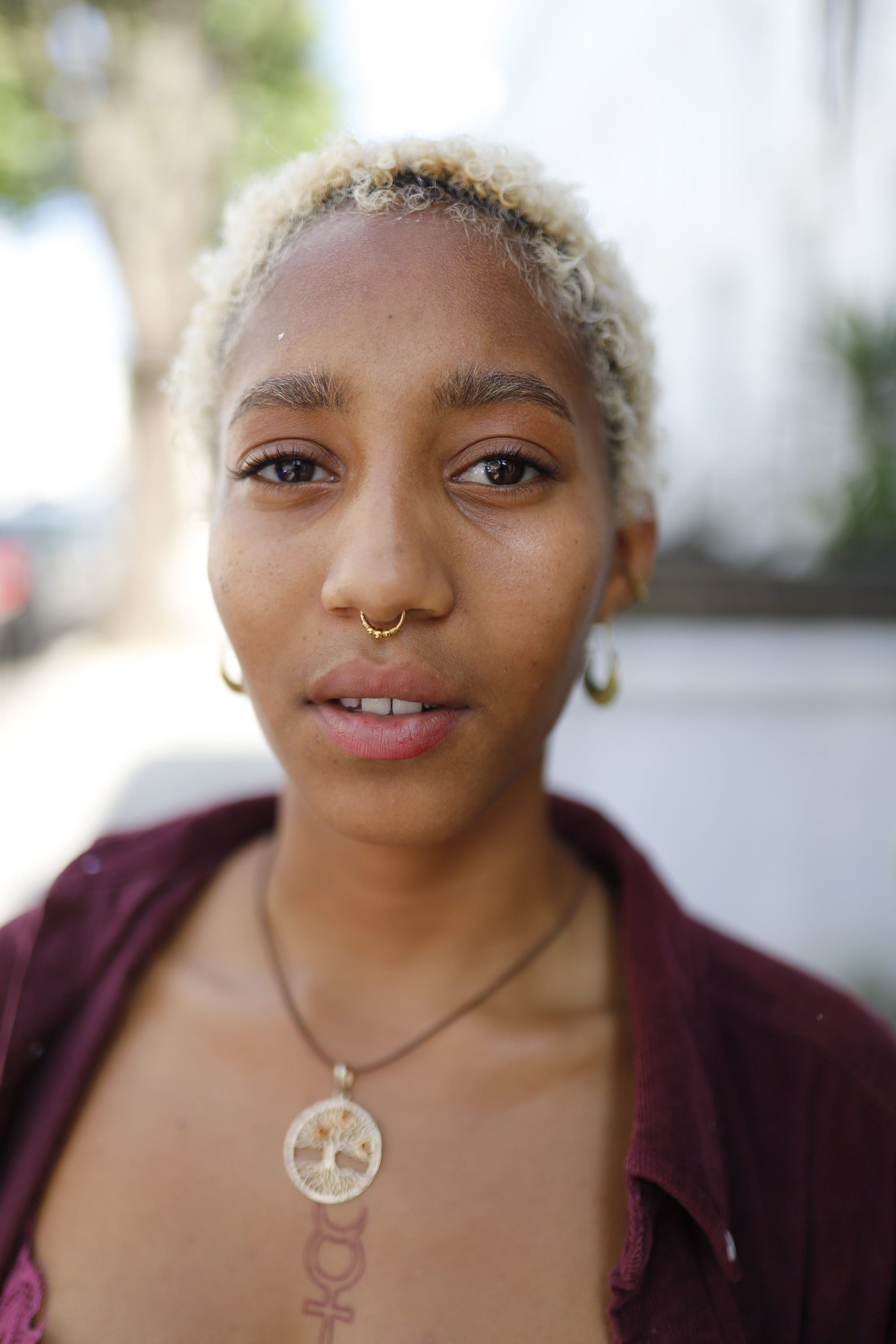 Young Woman in Profile — Outdoor Bokeh Portrait