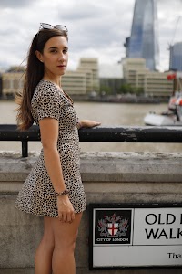 Young Woman Portrait on Thames Riverfront with Tower Bridge