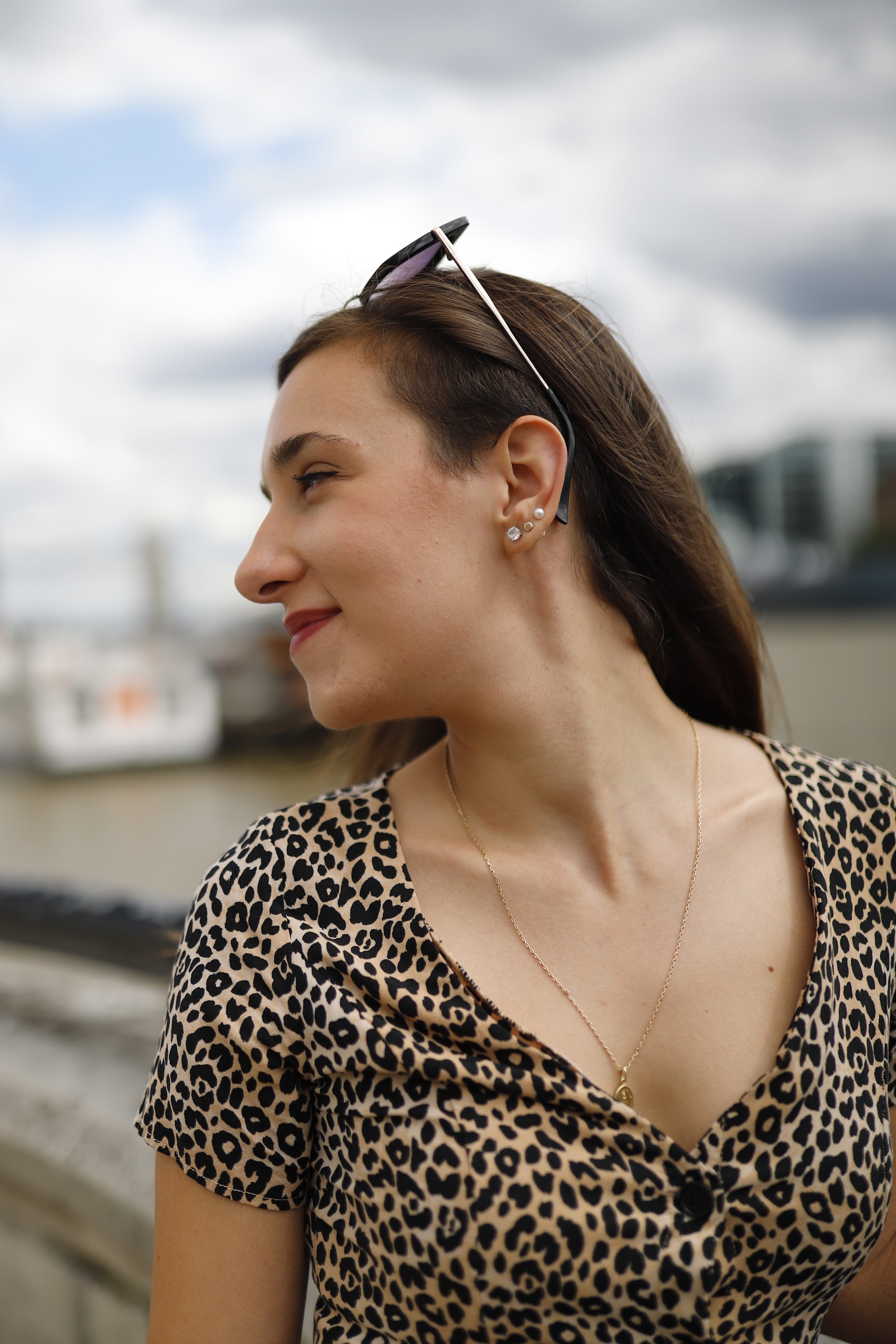 Young Woman Portrait on Thames Riverfront with Tower Bridge
