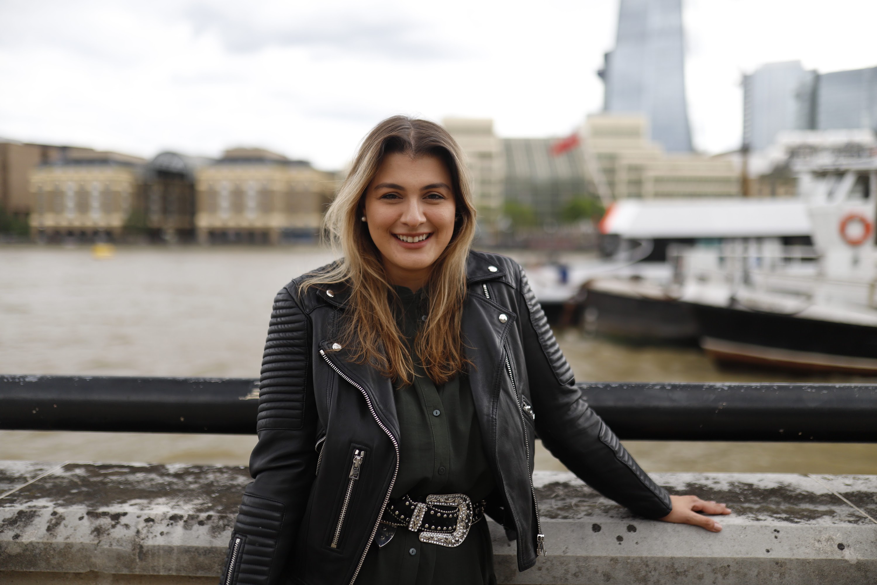 Young Woman Portrait in Front of Modern Building Staircase
