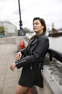 Young Woman Portrait in Front of Modern Building Staircase