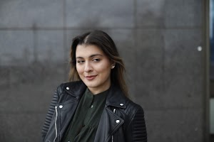 Young Woman Portrait in Front of Modern Building Staircase