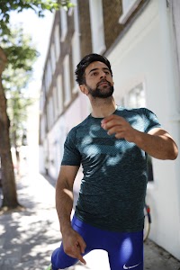Man in Nike Running Gear on London Residential Street