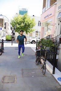Man in Nike Running Gear on London Residential Street
