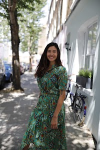 Woman in Green Botanical-Print Maxi Dress Outside London Mews