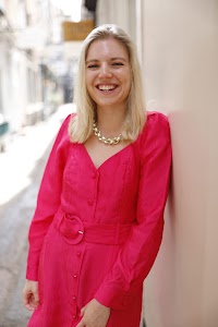 Young Woman in Pink Dress on Historic Pedestrian Lane