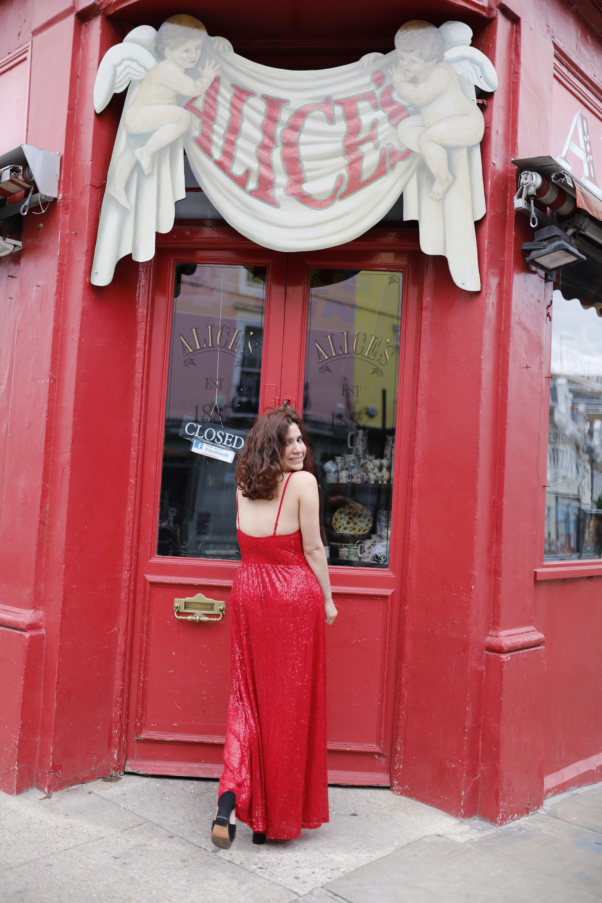 Woman in Red Sequin Dress at Notting Hill, London