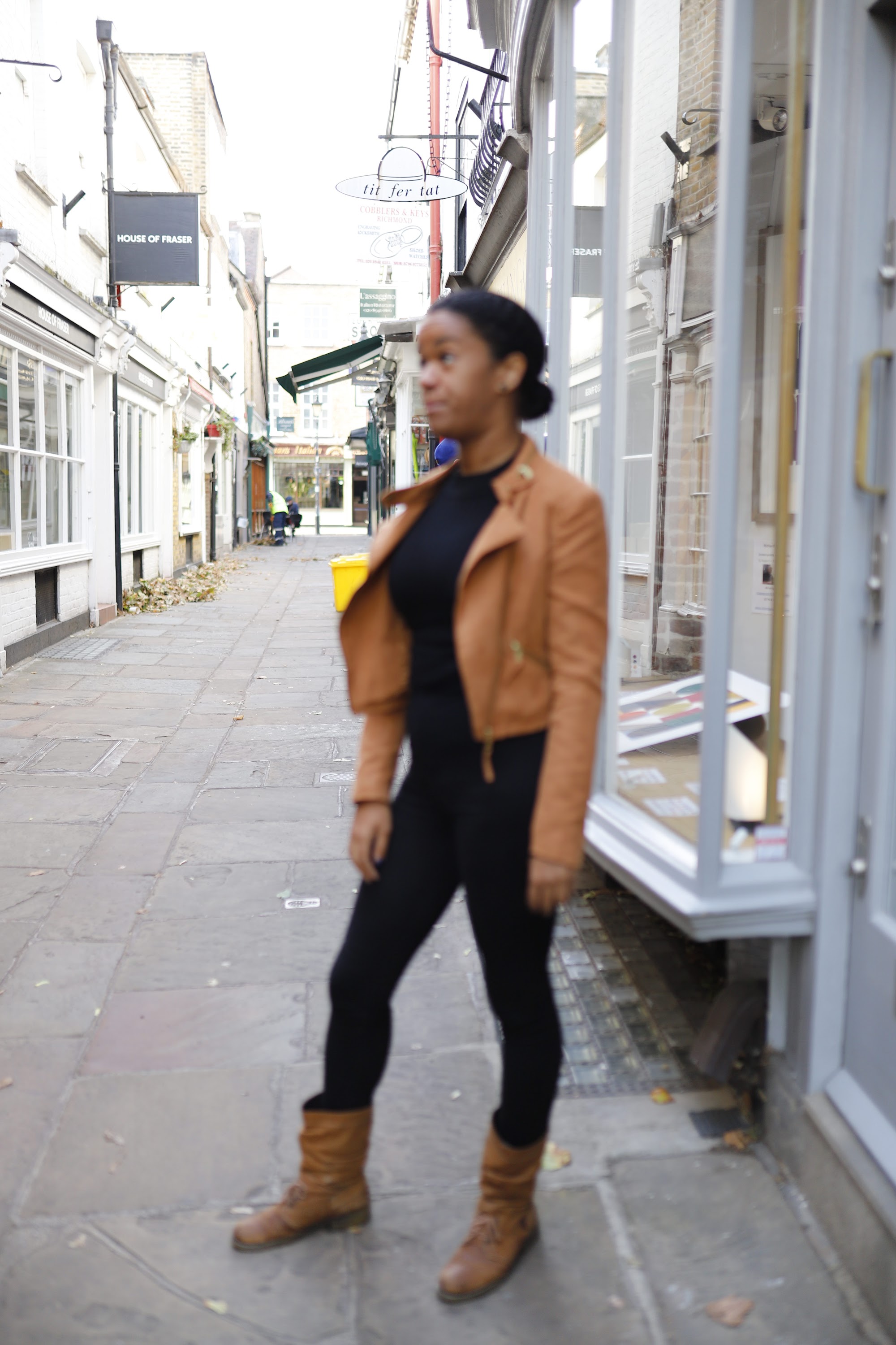 Young Woman in Tan Moto Jacket on Urban Street