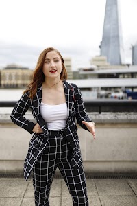Smiling Young Woman on London Thames Riverfront