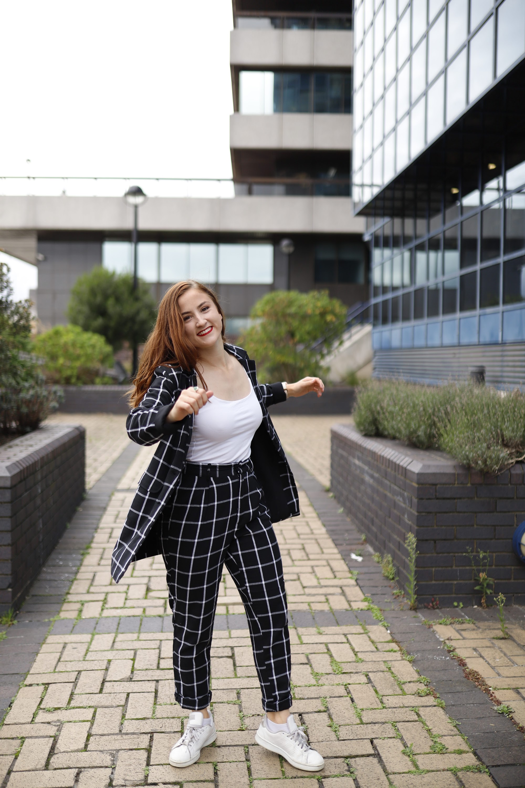 Smiling Young Woman on London Thames Riverfront