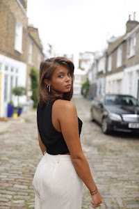 Young Woman Street Portrait on Tree-Lined Sidewalk