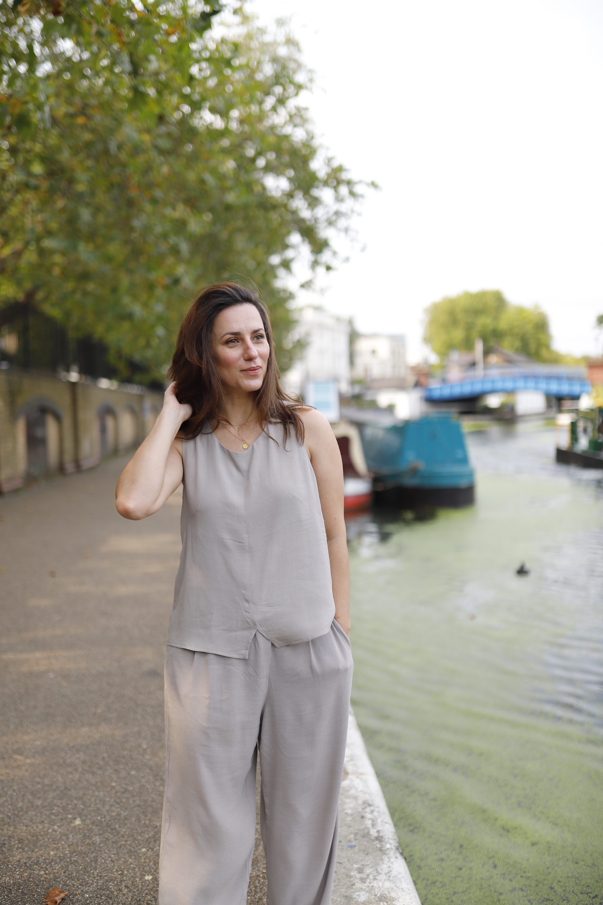 Woman by the Canal at Dusk