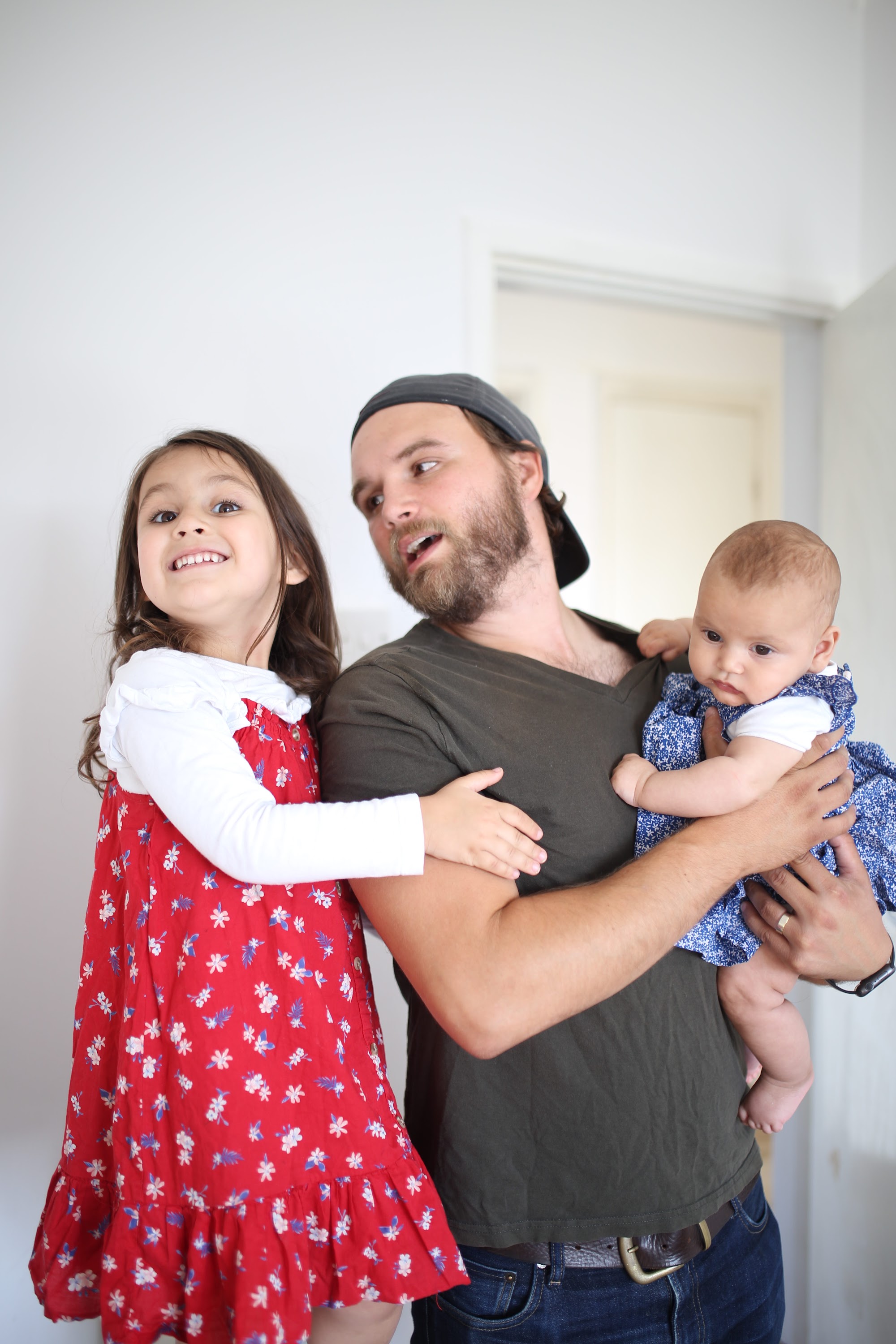 Family Portrait with Father and Two Daughters