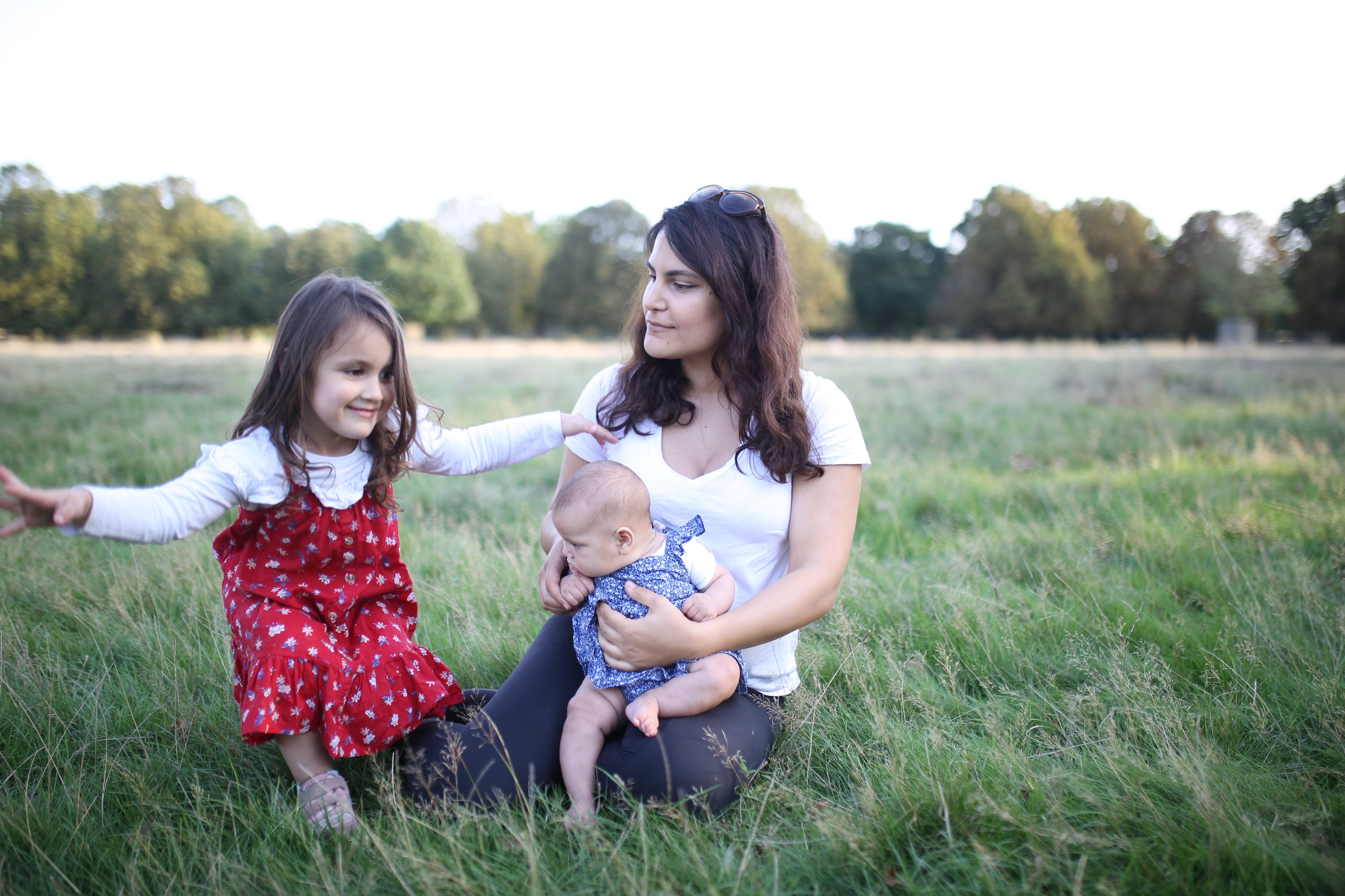 Family Portrait in a Sunlit Meadow