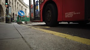 Red Double-Decker Bus Motion Blur on Regent Street, London