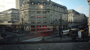 Oxford Circus, London — H&M Corner Building at Dusk