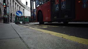Red Double-Decker Bus Motion Blur on Regent Street, London