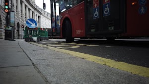 Red Double-Decker Bus Motion Blur on Regent Street, London