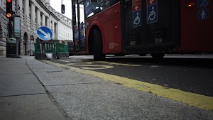Red Double-Decker Bus Motion Blur on Regent Street, London