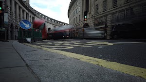 Red Double-Decker Bus Motion Blur on Regent Street, London