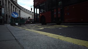 Red Double-Decker Bus Motion Blur on Regent Street, London