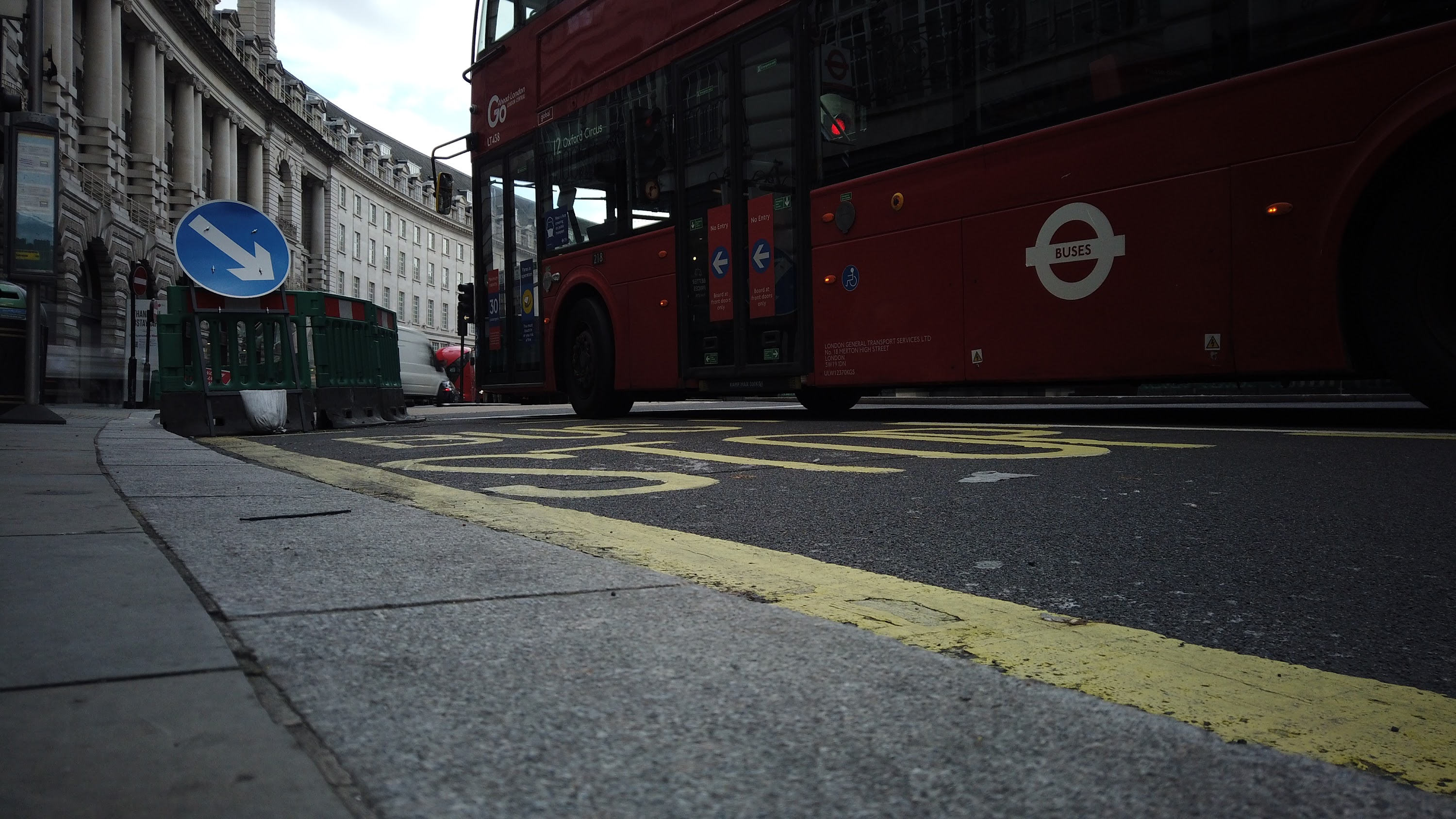 Red Double-Decker Bus Motion Blur on Regent Street, London