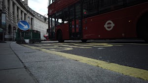 Red Double-Decker Bus Motion Blur on Regent Street, London