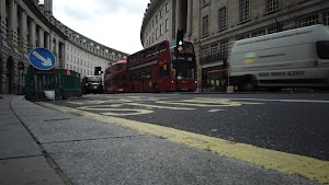 Red Double-Decker Bus Motion Blur on Regent Street, London