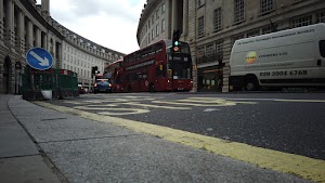 Red Double-Decker Bus Motion Blur on Regent Street, London