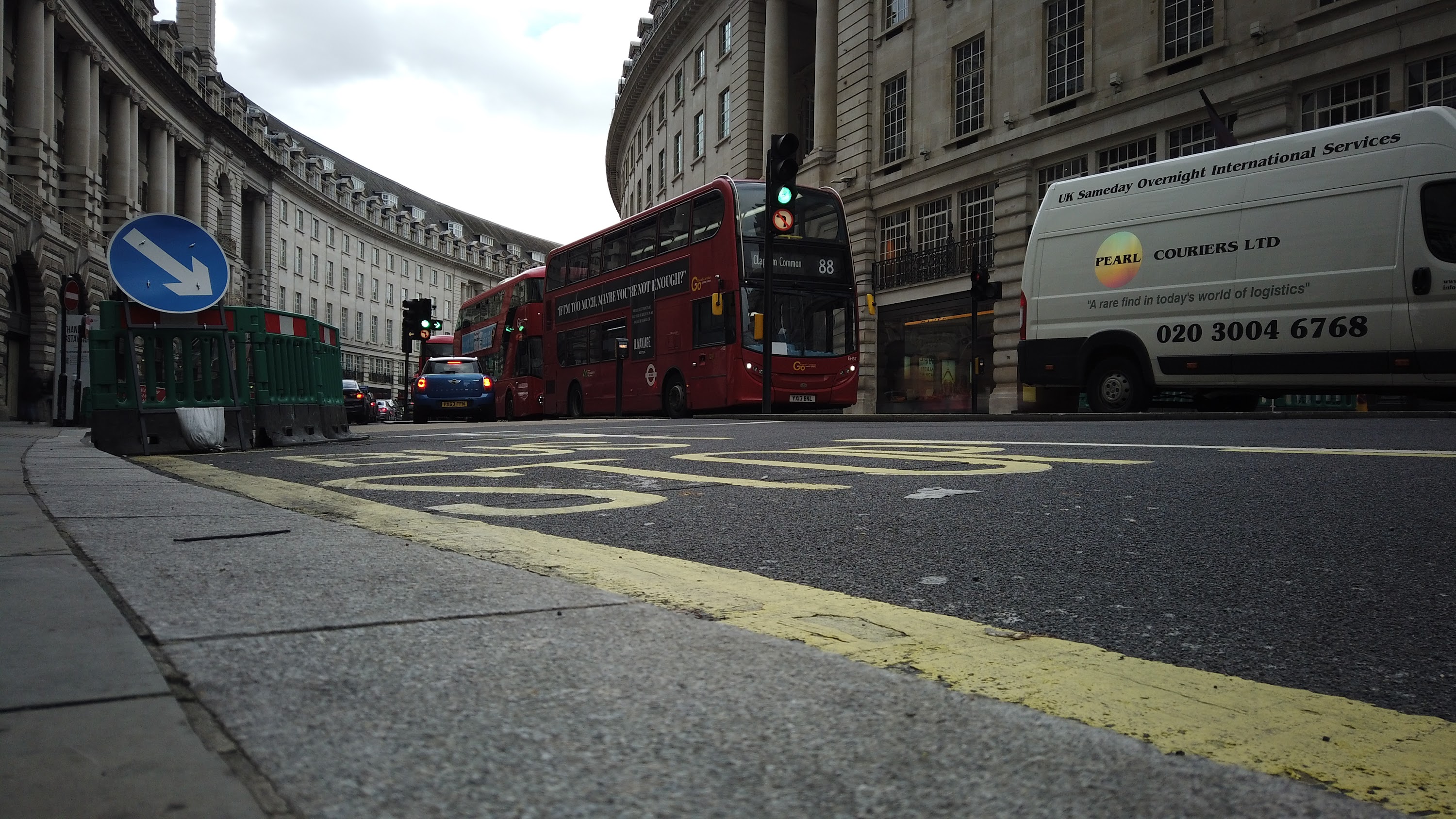 Red Double-Decker Bus Motion Blur on Regent Street, London