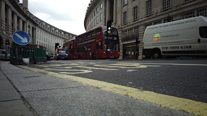 Red Double-Decker Bus Motion Blur on Regent Street, London