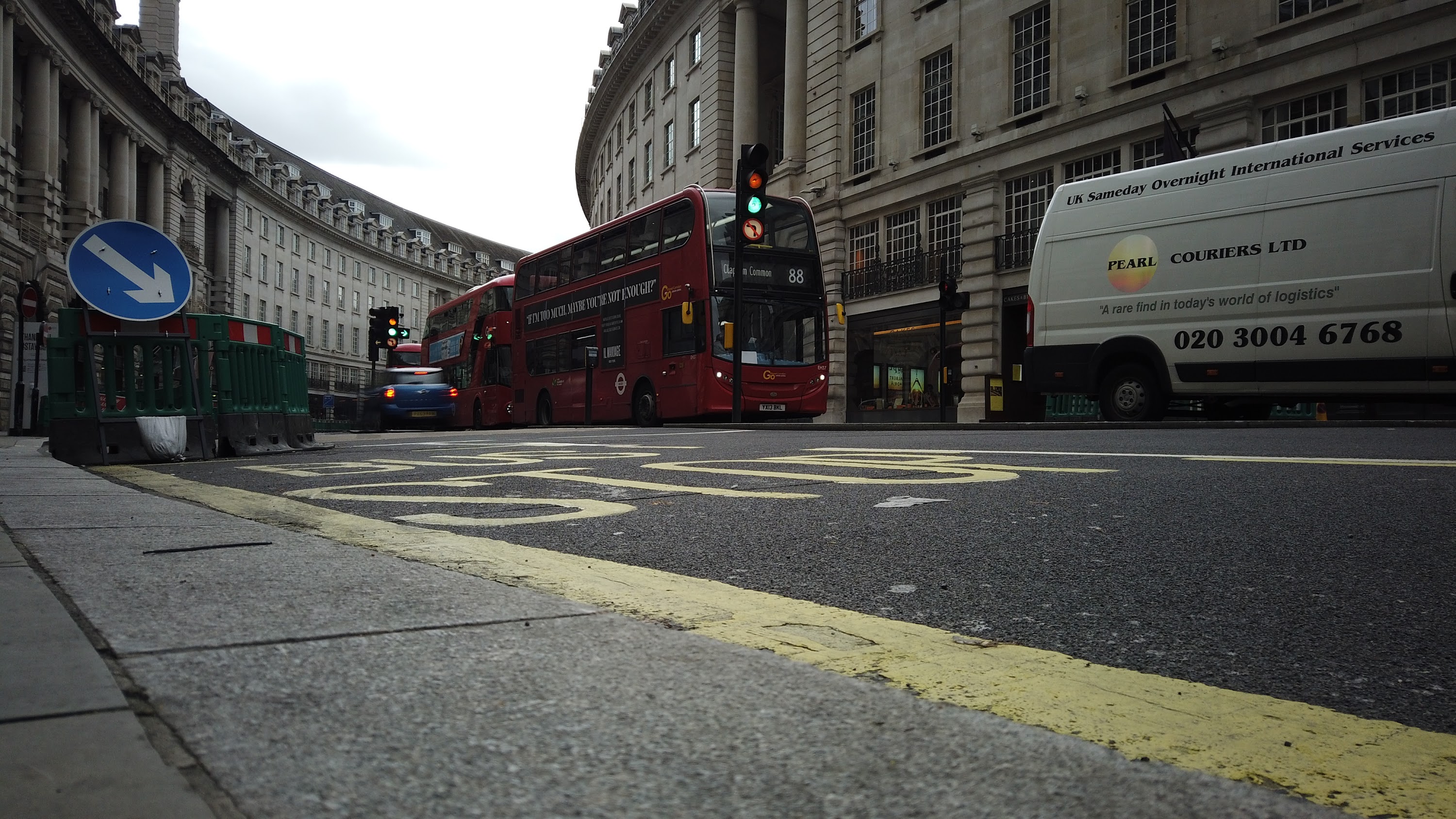 Red Double-Decker Bus Motion Blur on Regent Street, London