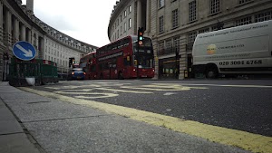 Red Double-Decker Bus Motion Blur on Regent Street, London