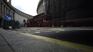 Red Double-Decker Bus Motion Blur on Regent Street, London