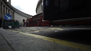 Red Double-Decker Bus Motion Blur on Regent Street, London