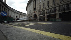Red Double-Decker Bus Motion Blur on Regent Street, London