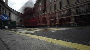 Red Double-Decker Bus Motion Blur on Regent Street, London