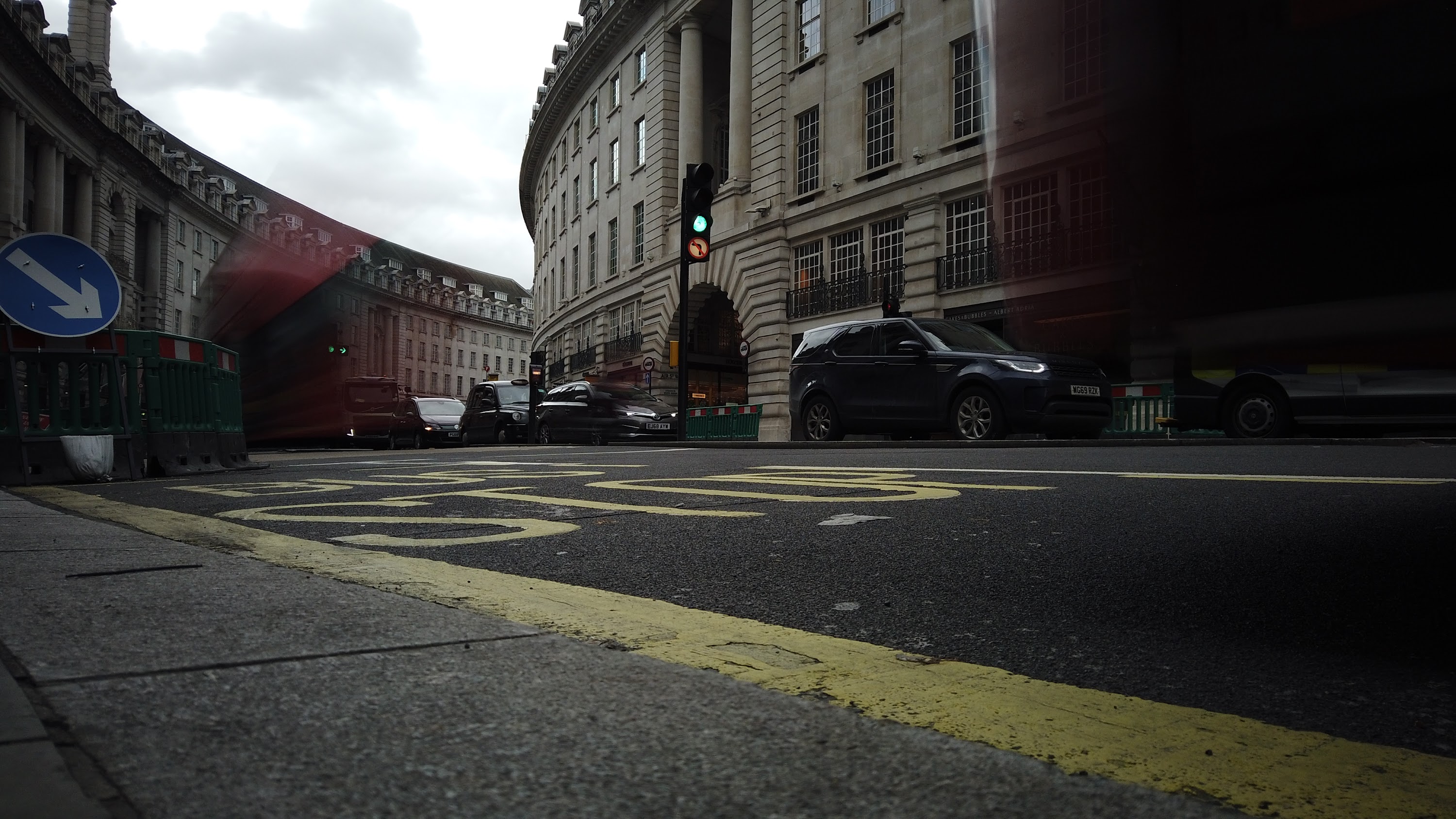 Red Double-Decker Bus Motion Blur on Regent Street, London